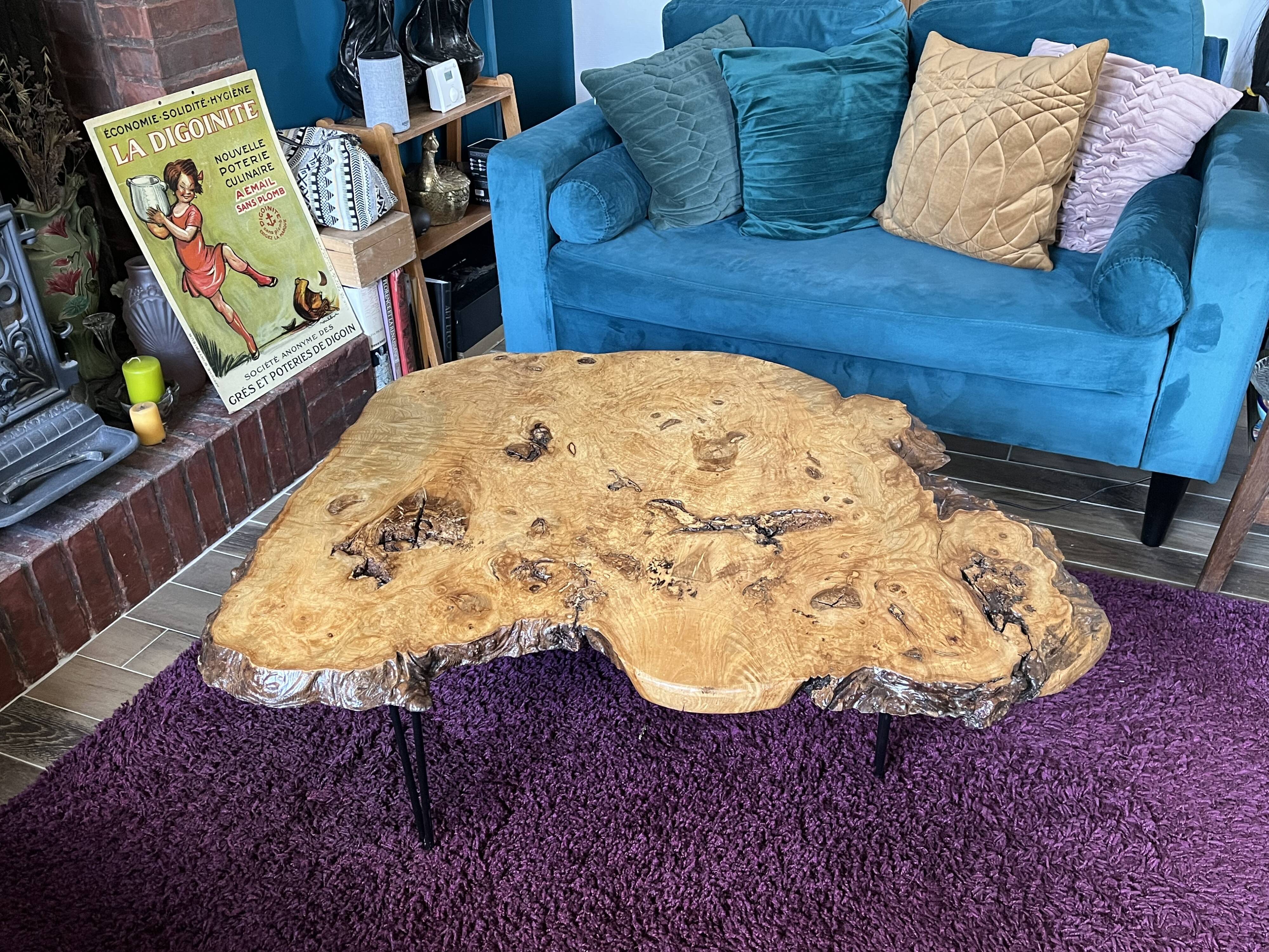 Tripod coffee table in natural solid elm magnifying glass