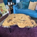 Tripod coffee table in natural solid elm magnifying glass