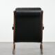 Fauteuil chesterfield en cuir de vachette noir classique et confortable