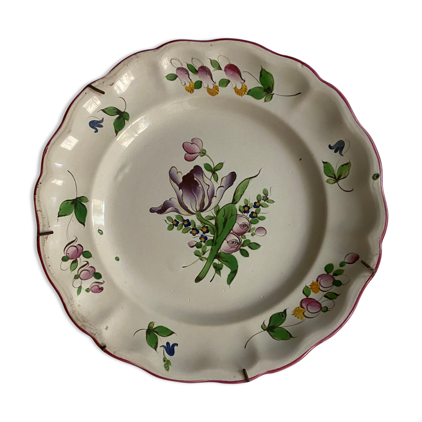 Plate of Nevers in earthenware late eighteenth century floral decoration