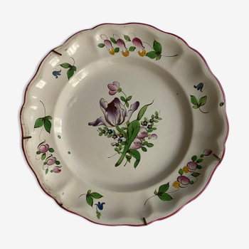 Plate of Nevers in earthenware late eighteenth century floral decoration