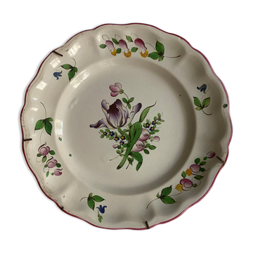 Plate of Nevers in earthenware late eighteenth century floral decoration