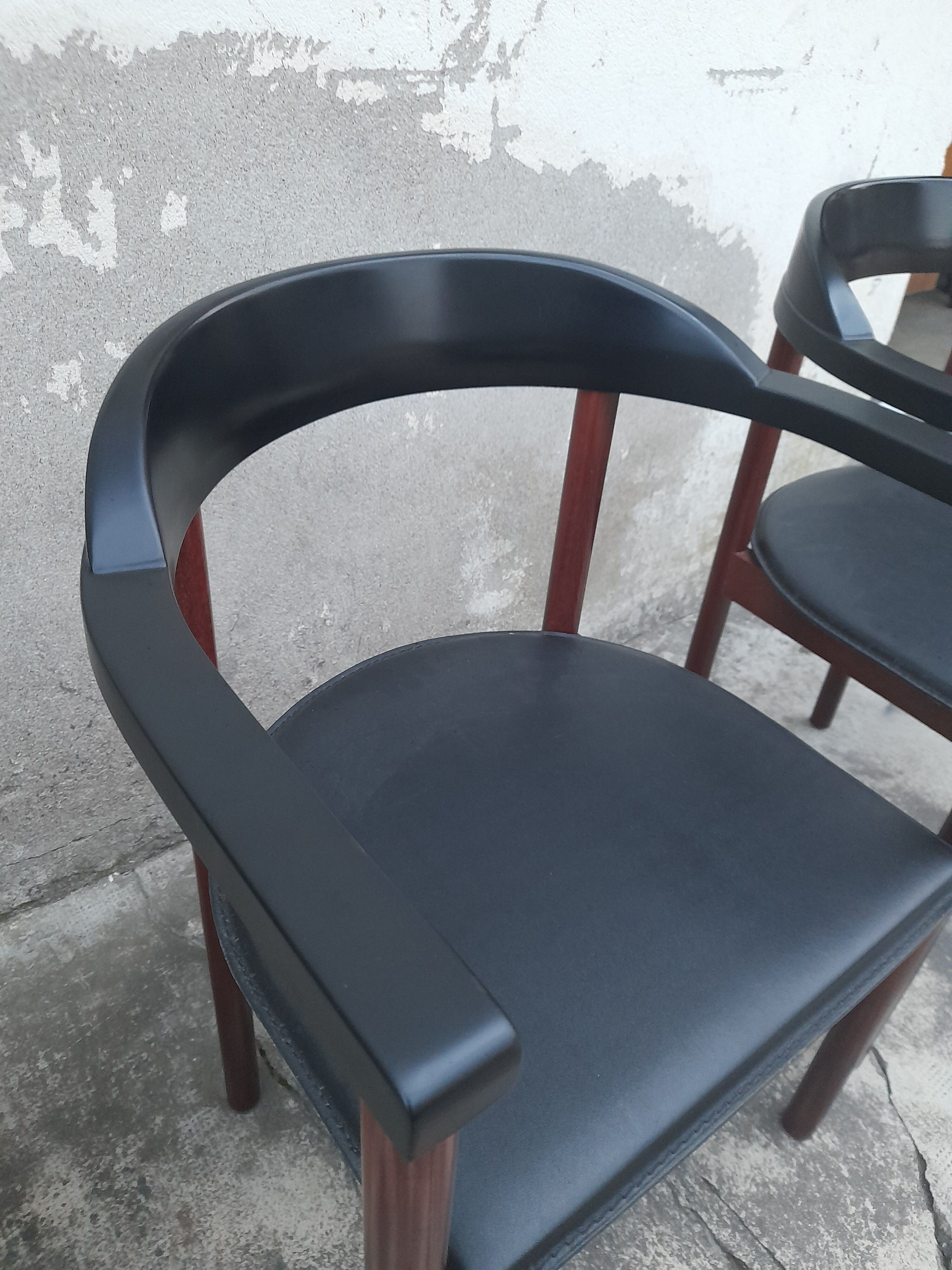 Pair of Scandinavian armchairs in teak and leather