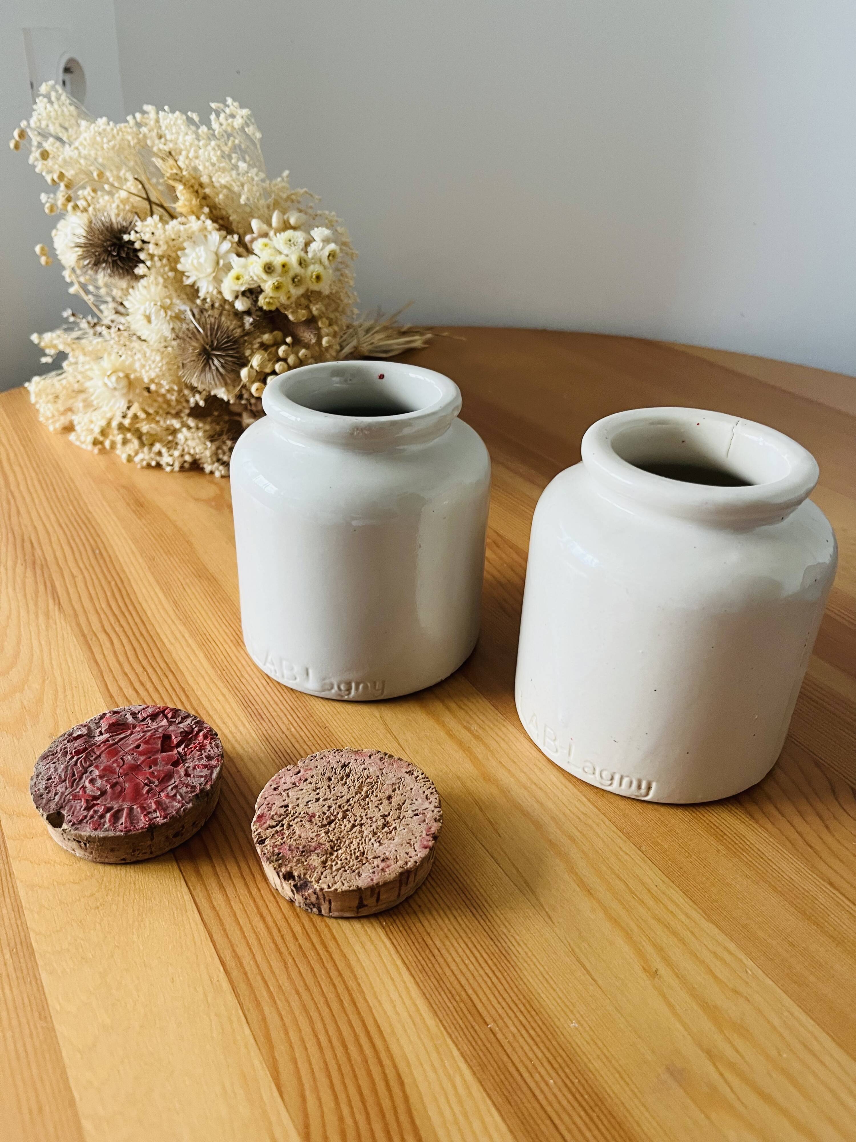 Ancient sandstone mustard pots