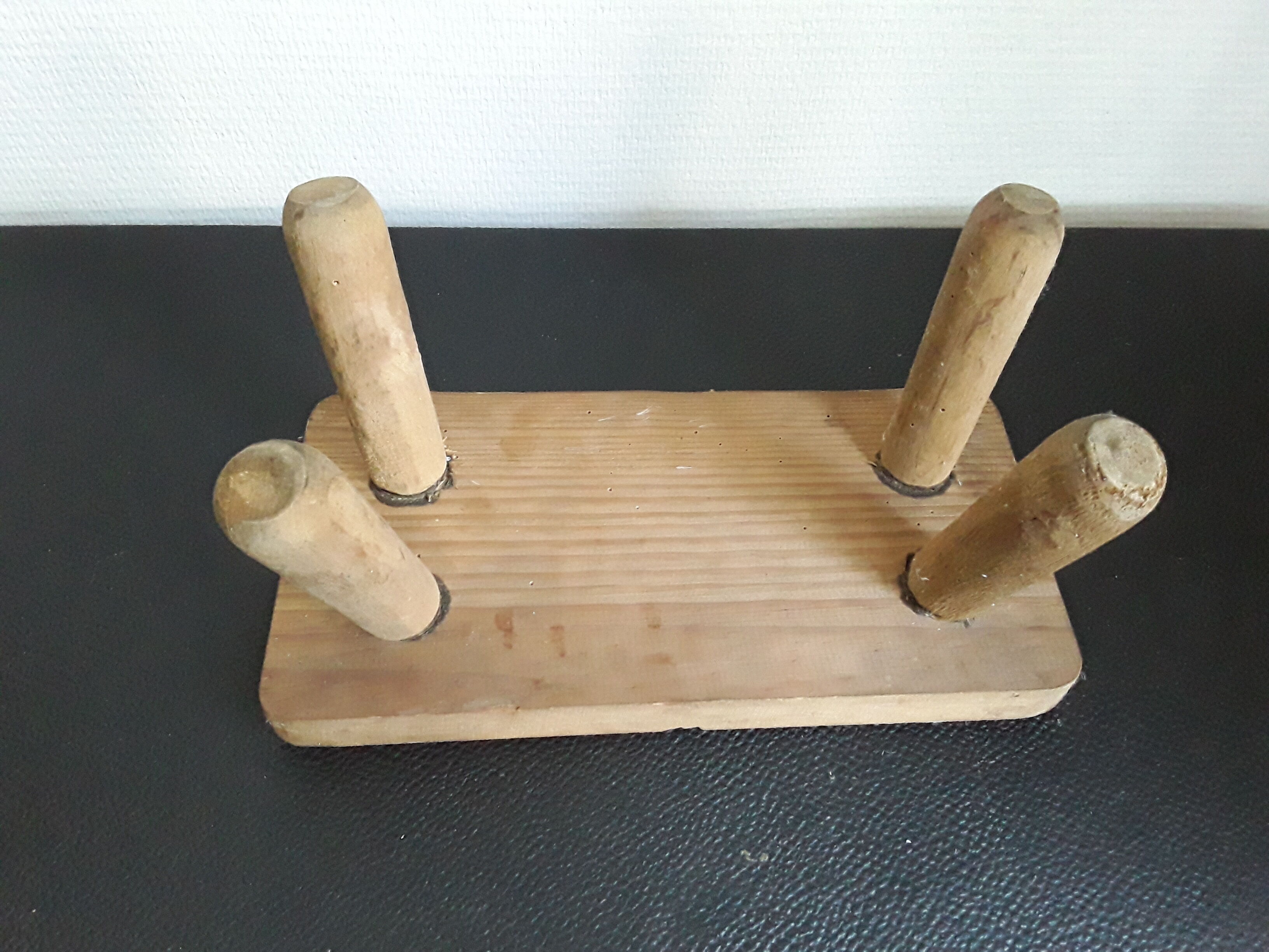 Vintage footstool in light wood
