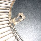 Round sun mirror with pearl rays and leaves