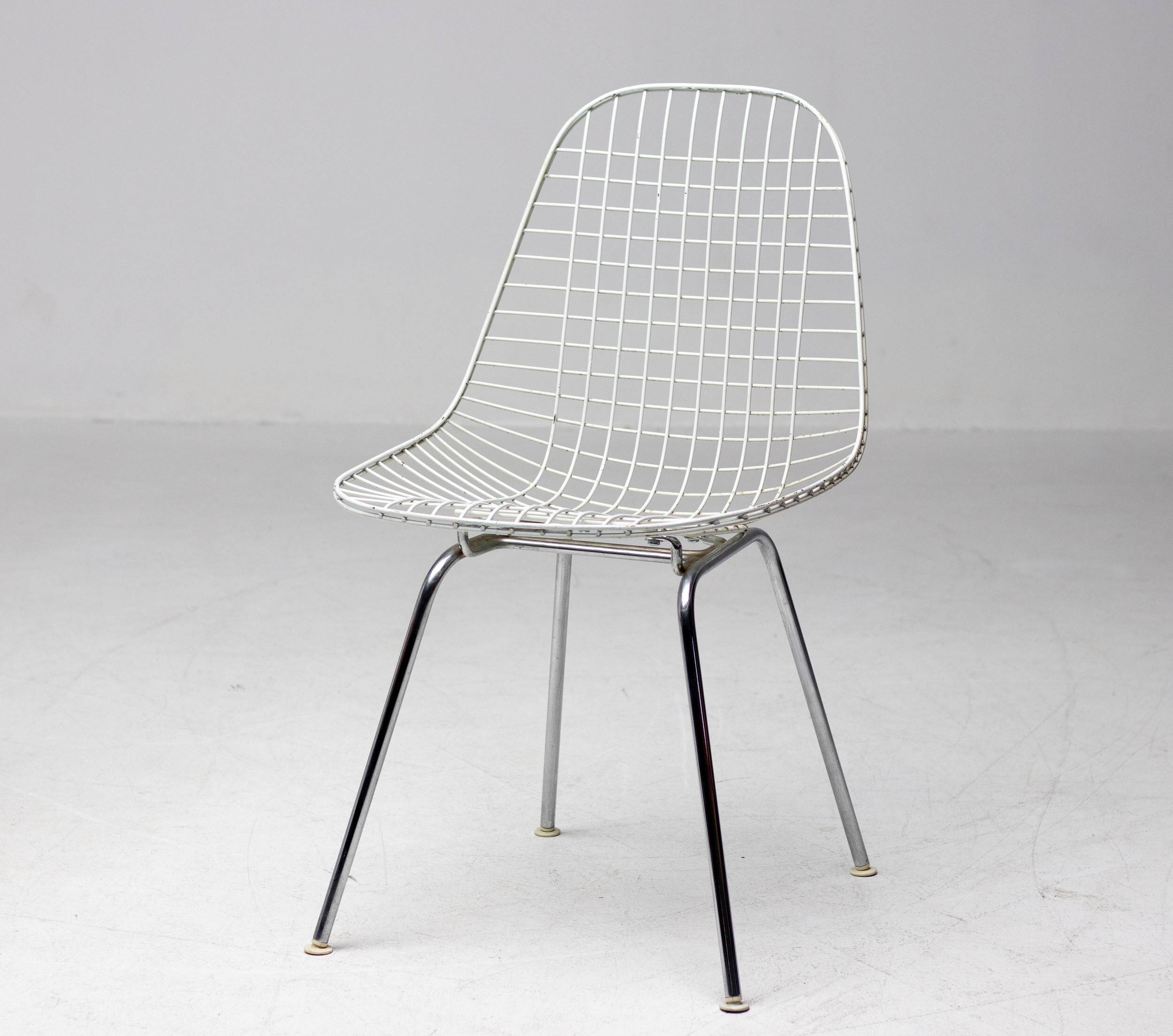 Set of 4 Eames wire chairs for Herman Miller with original Bikini seats by Girard.