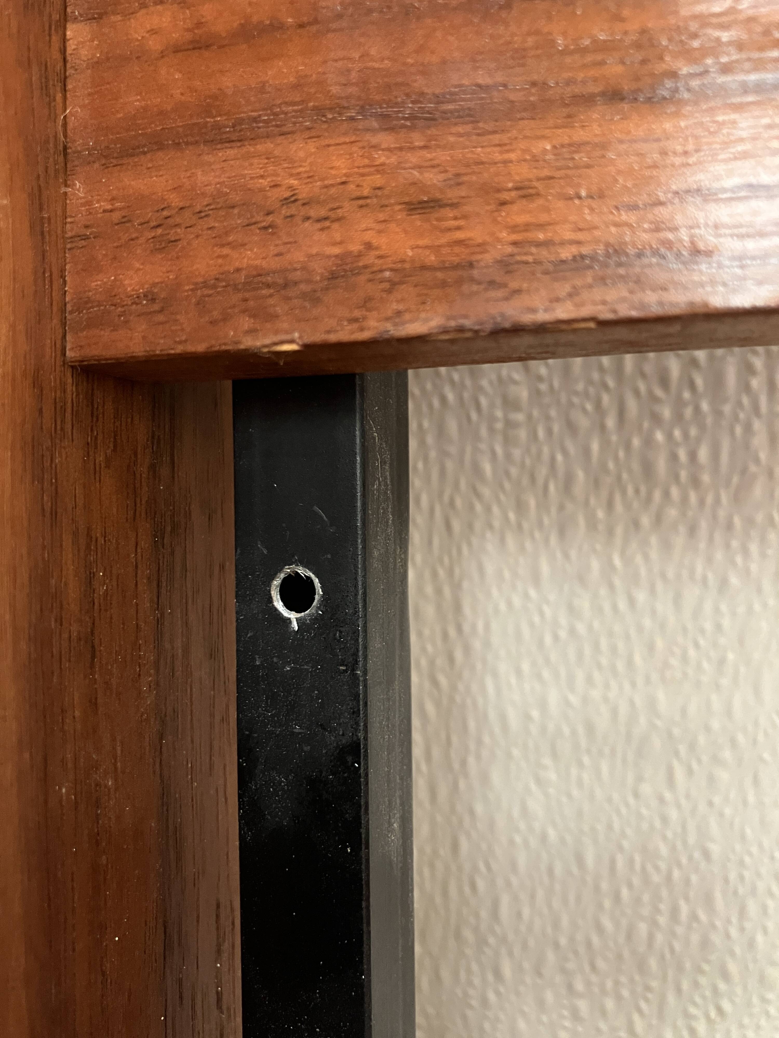 Vintage 1960s hallway cabinet with coat rack and shoe storage.
