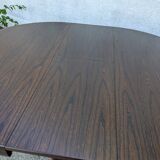 Round table with butterfly extensions