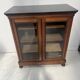 Display cabinet at counter height in mahogany and veneer, 19th century.