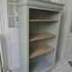 Louis Philippe style bookcase reenchanted in verdigris, 3 light oak waxed shelves.
