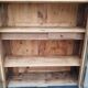 Bookcase black patina shell pediment 2 drawer doors