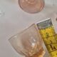 set of 12 stemmed glasses and 3 small vintage pink liqueur glasses in rosaline
