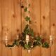 Antique metal chandelier with Art Nouveau floral decoration
