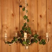 Antique metal chandelier with Art Nouveau floral decoration