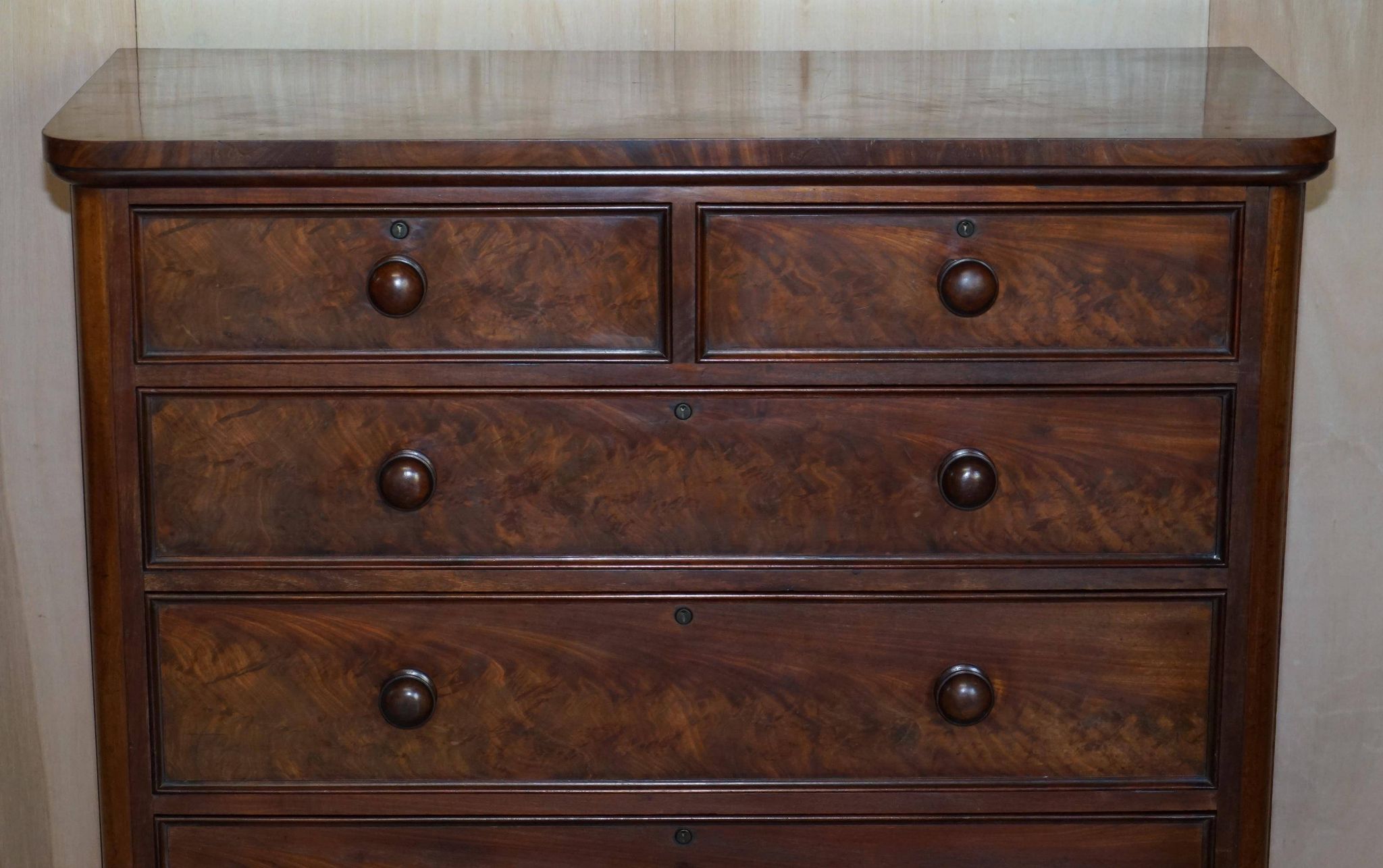 Victorian commode in flame wood with four drawers