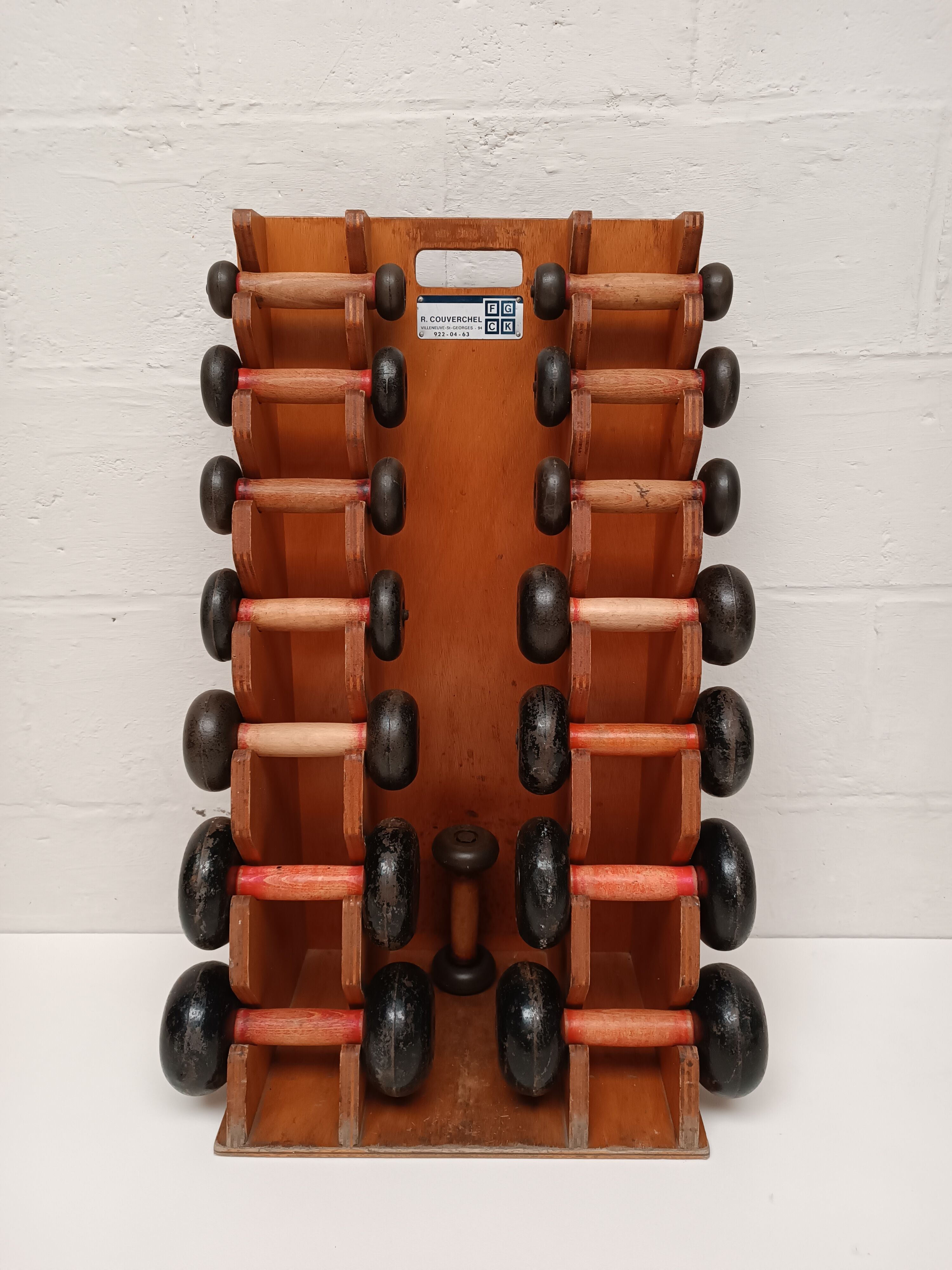60s dumbbell wall display