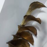 Wall lamp design in gilded metal, leaf décor