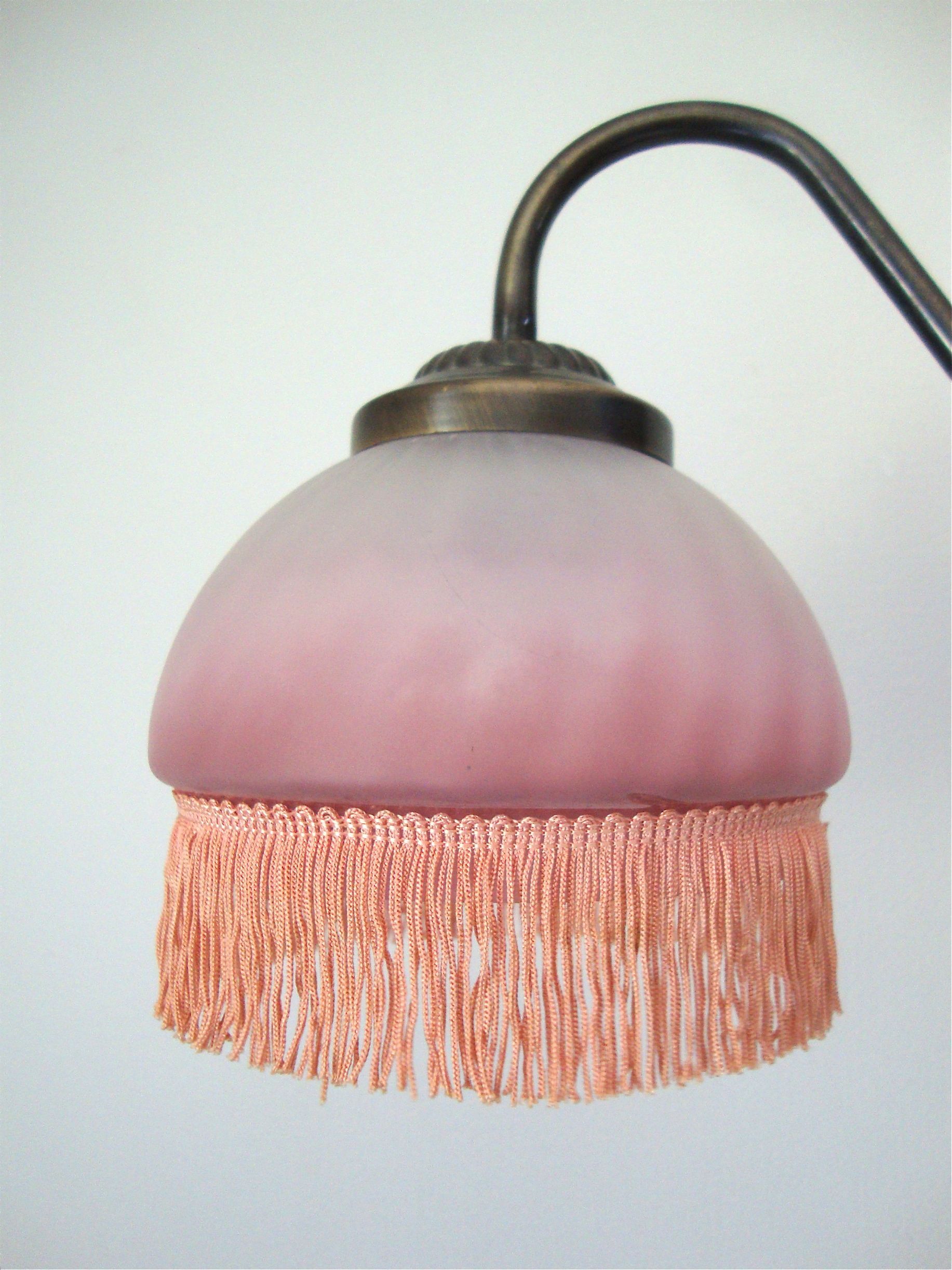 Fringed sconce
