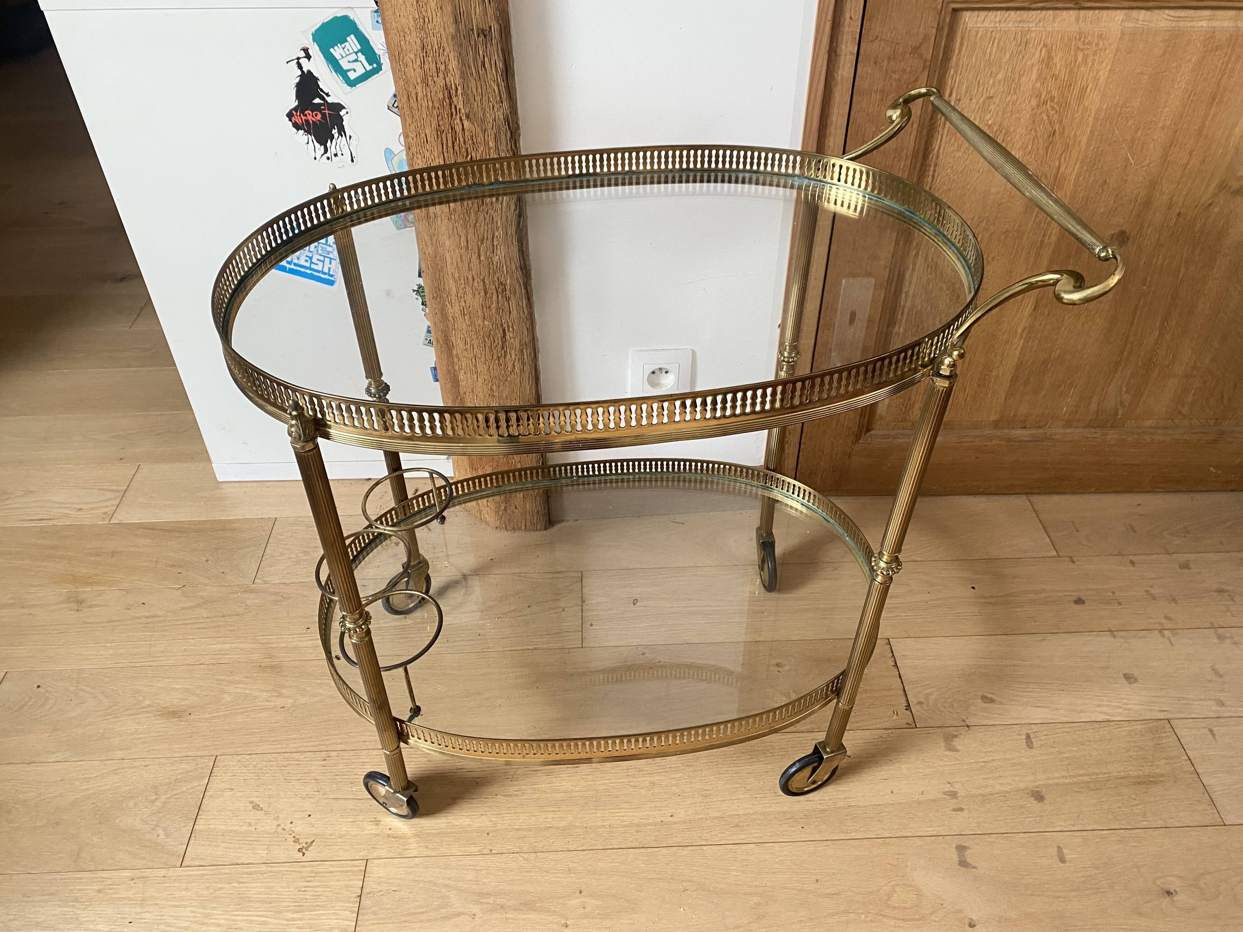 Oval golden brass rolling dessert trolley, Maison Jansen style, 1960s.