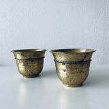 Pair of brass cord pot covers
