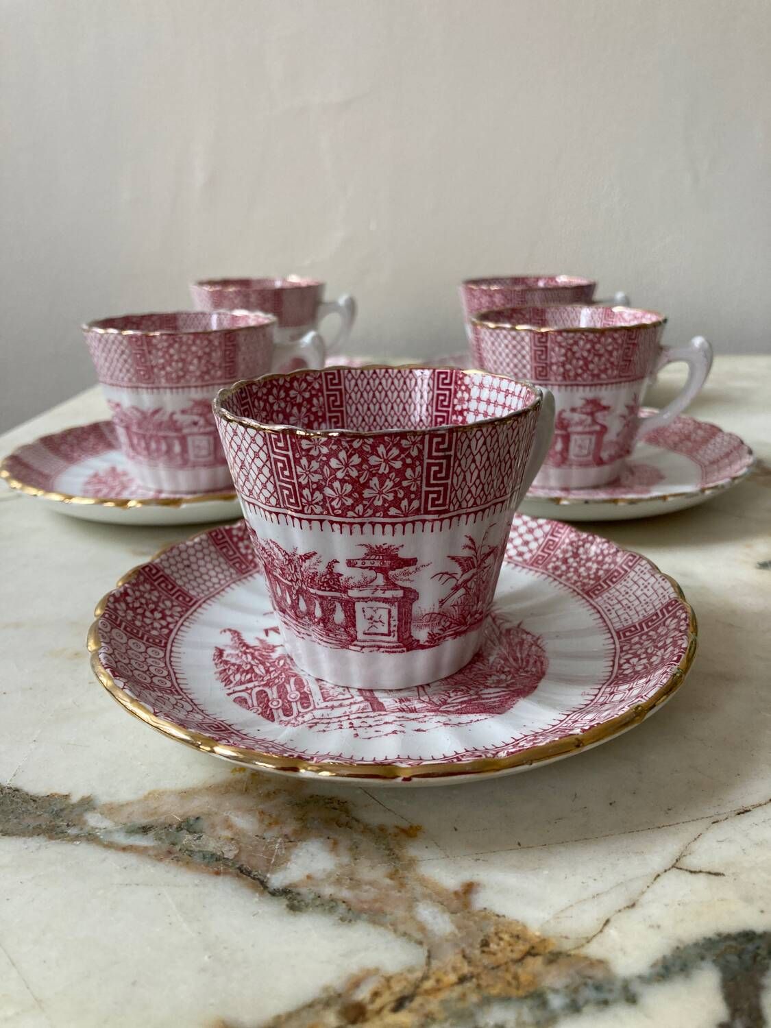 Set of 5 Lunéville “K and G” cups and saucers