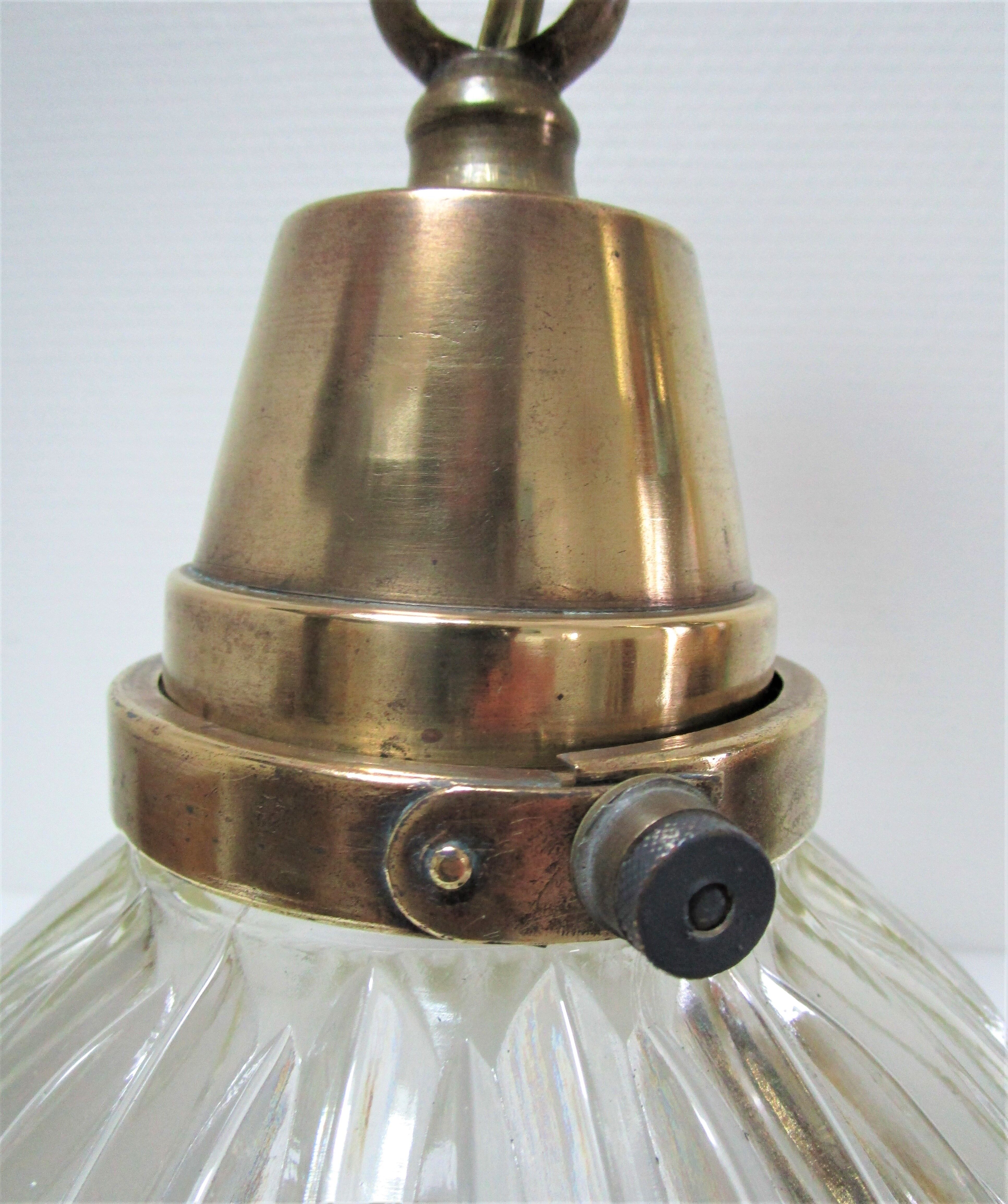 Holophane glass suspension and vintage patinated brass
