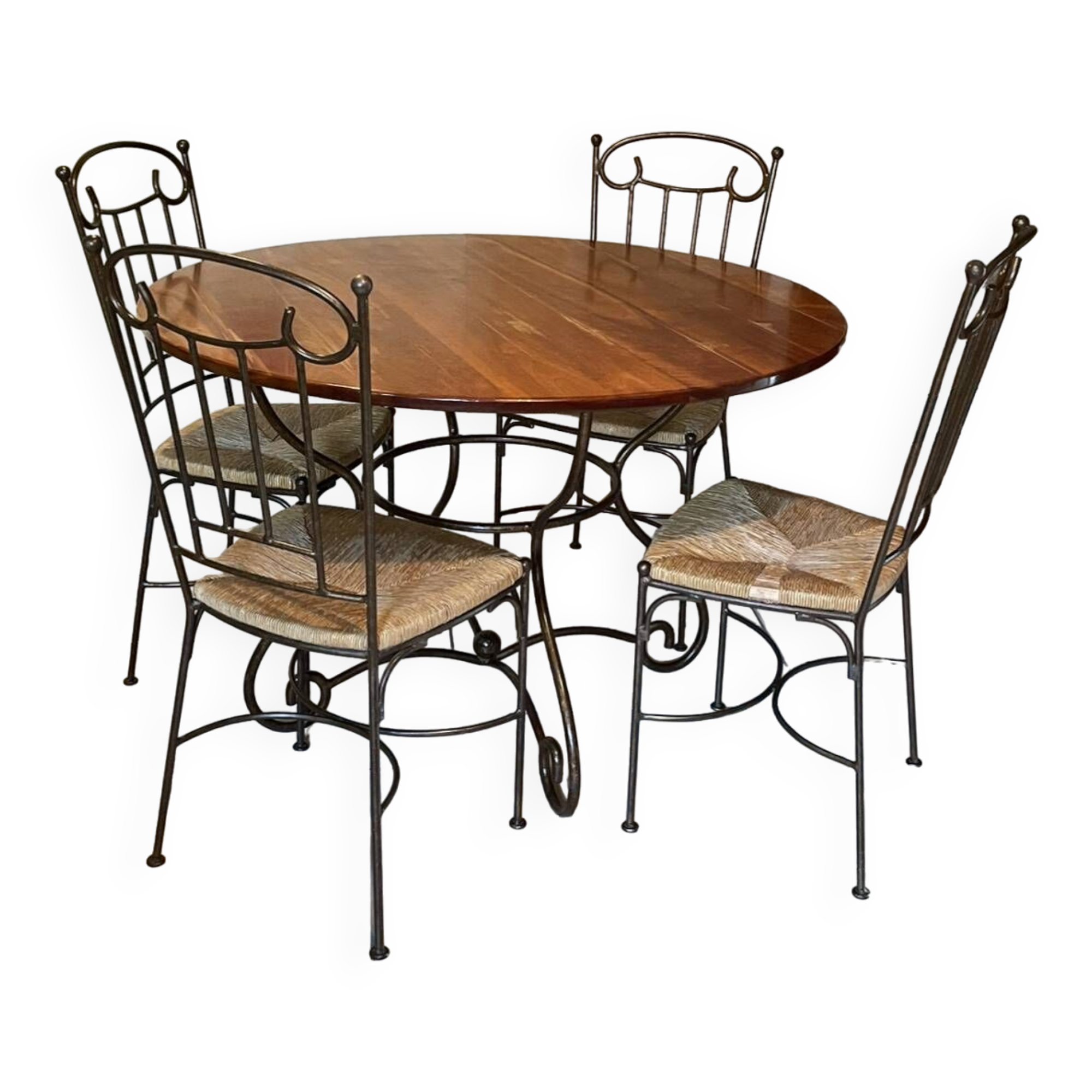 Table and four wrought iron and wood chairs.