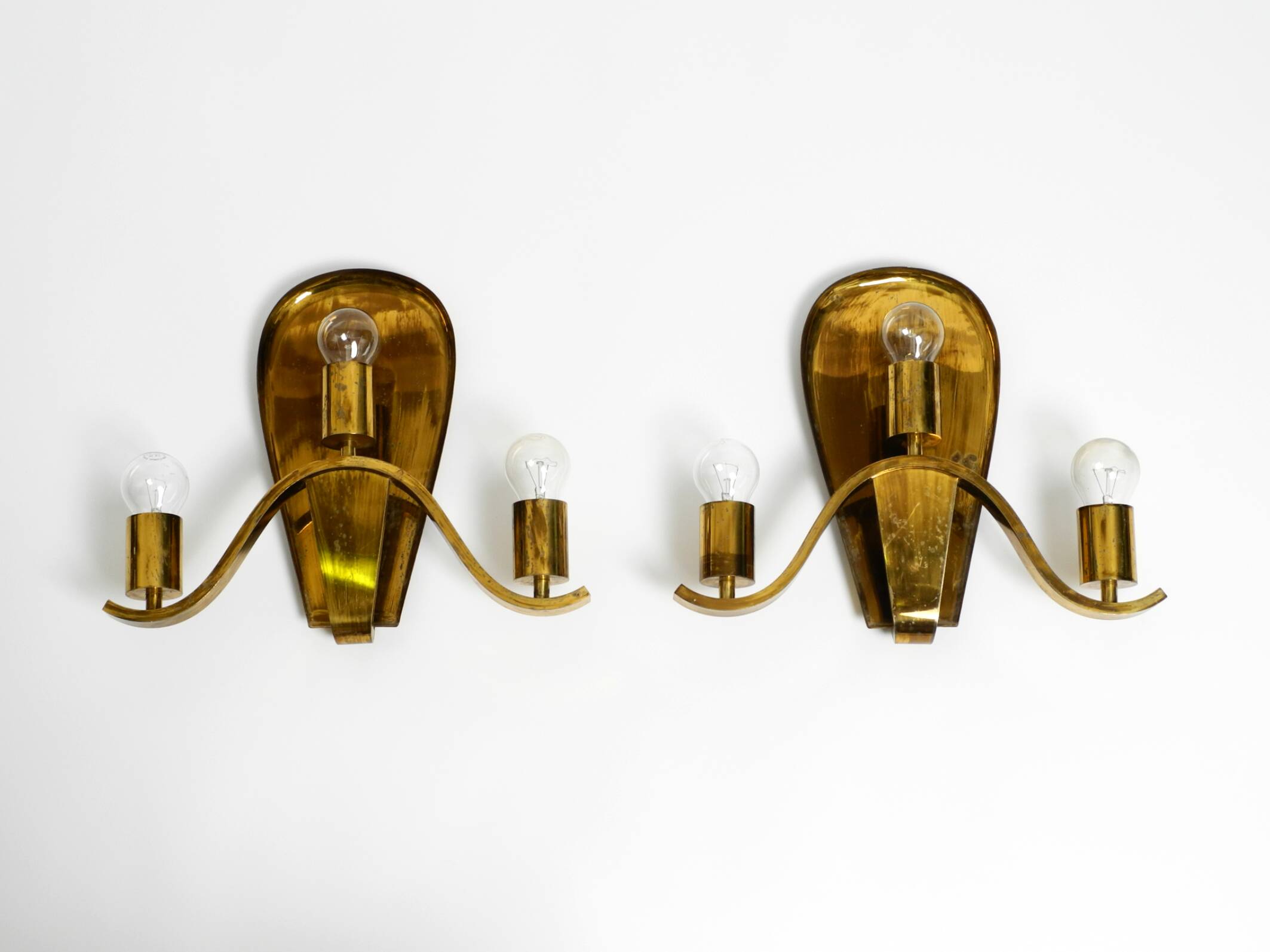 Pair of large heavy Mid Century brass wall lights from a German church