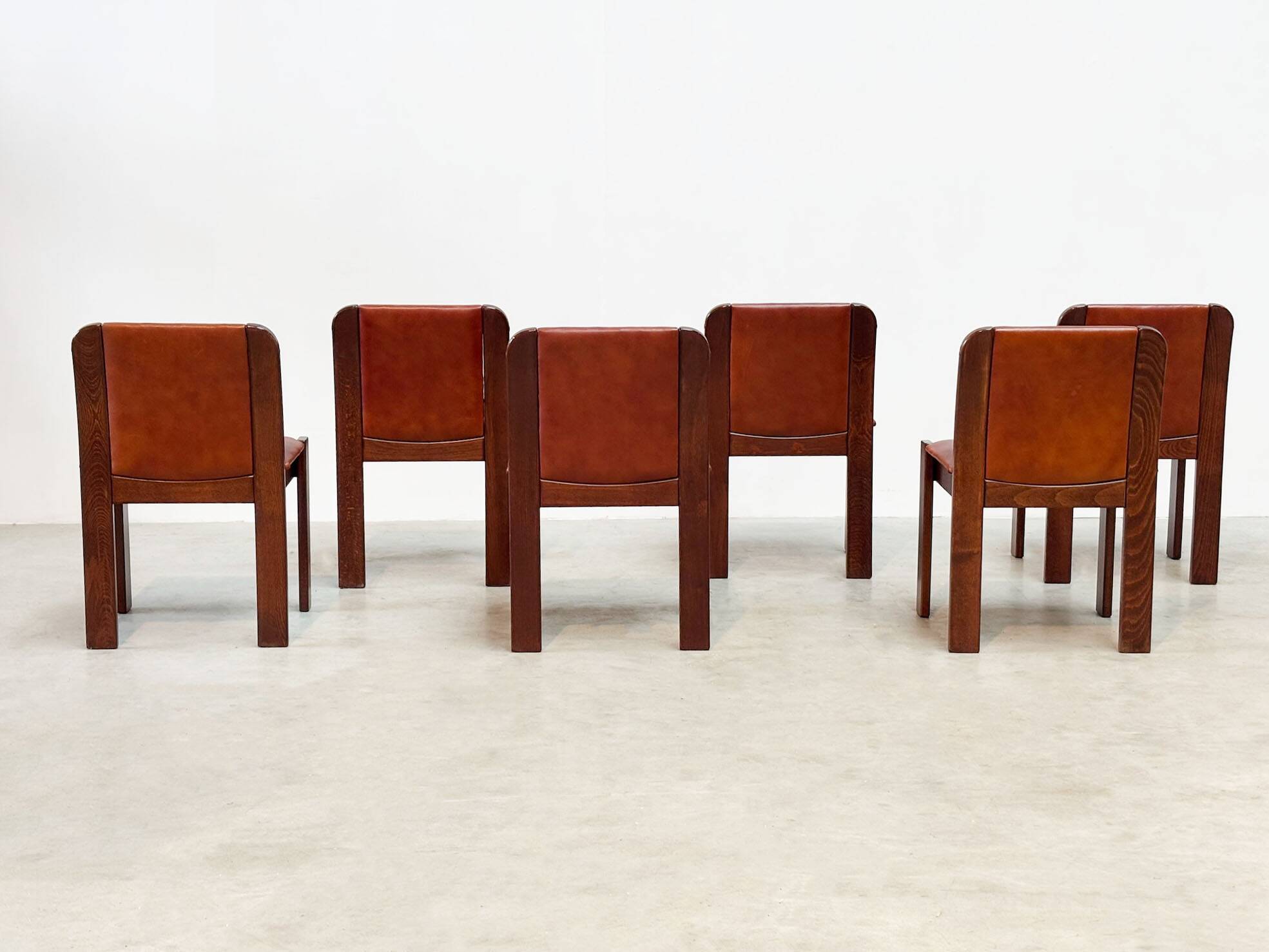 Set of six leather Italian dining chairs