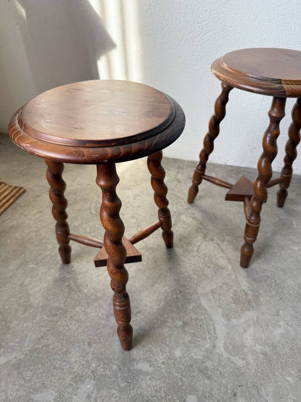 Set of 4 turned oak stools.