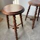 Set of 4 turned oak stools.