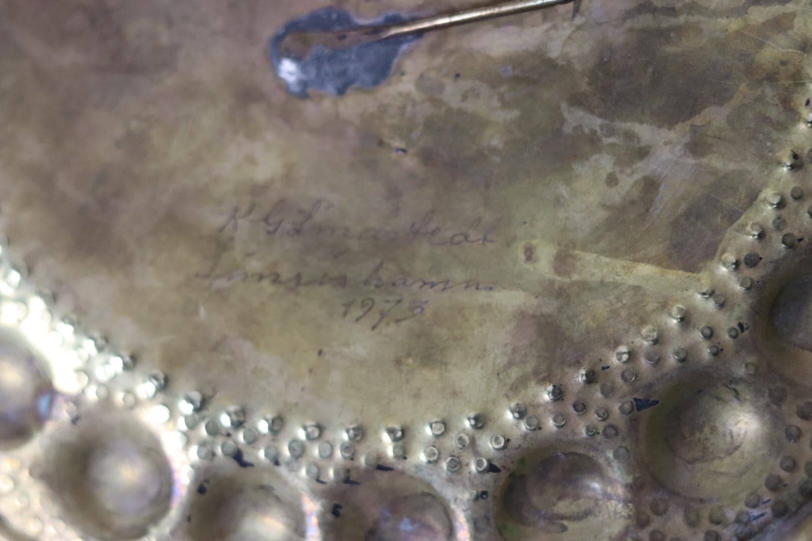 A pair of Swedish brass wall lights from the 1970s.