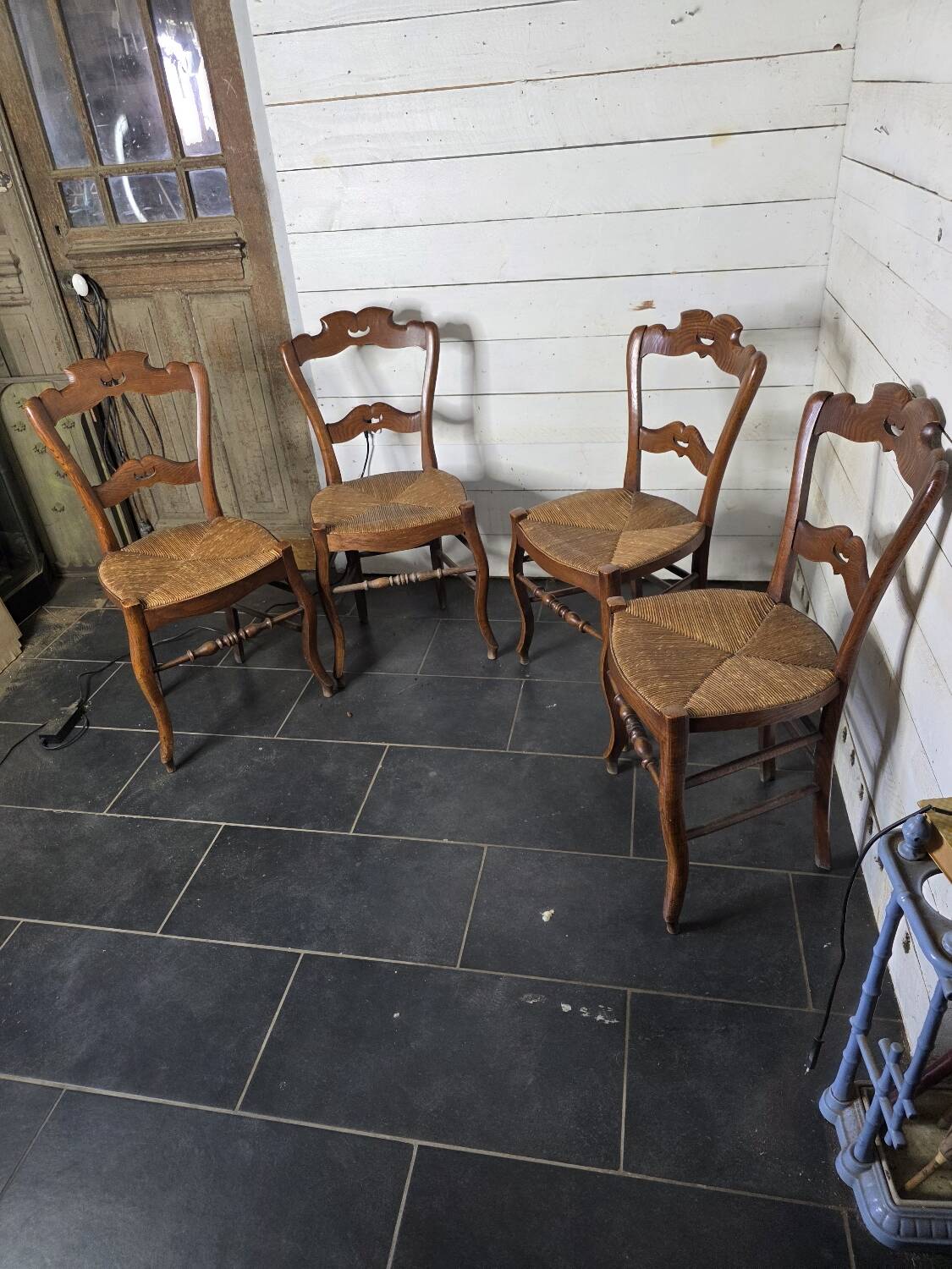 4 old straw chairs