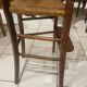 Ancienne chaise haute paillée