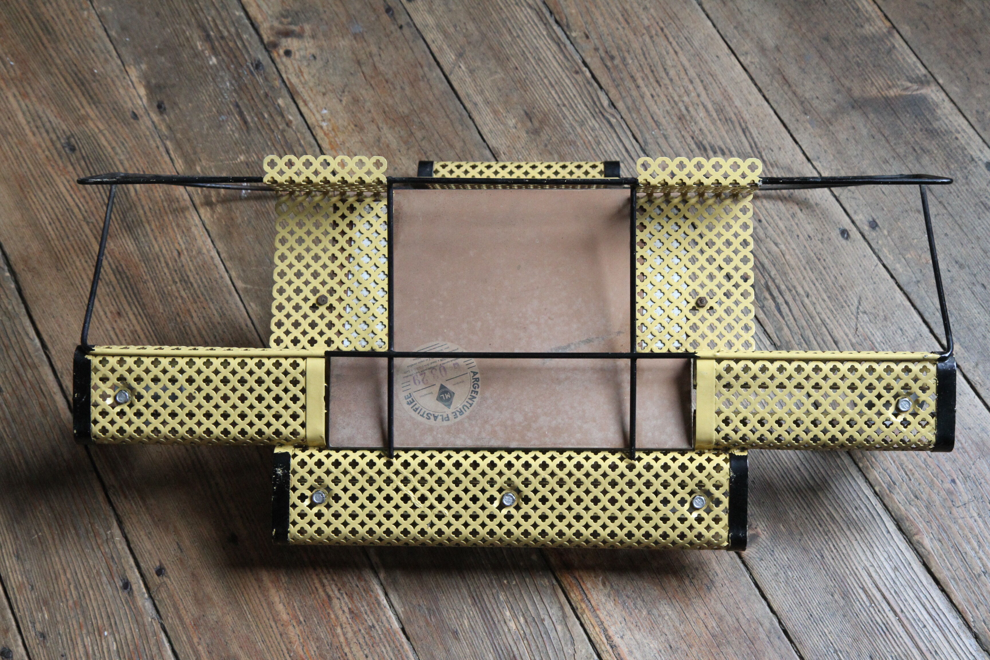 1950s perforated metal coat holder