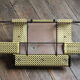 1950s perforated metal coat holder