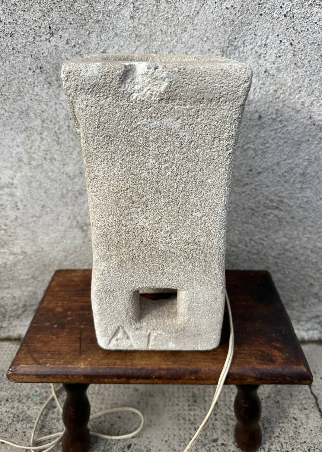 Anthropomorphic stone table lamp brutalised by Albert Tormos.