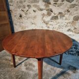 Vintage French round dining table in cherry wood, circa 1920.