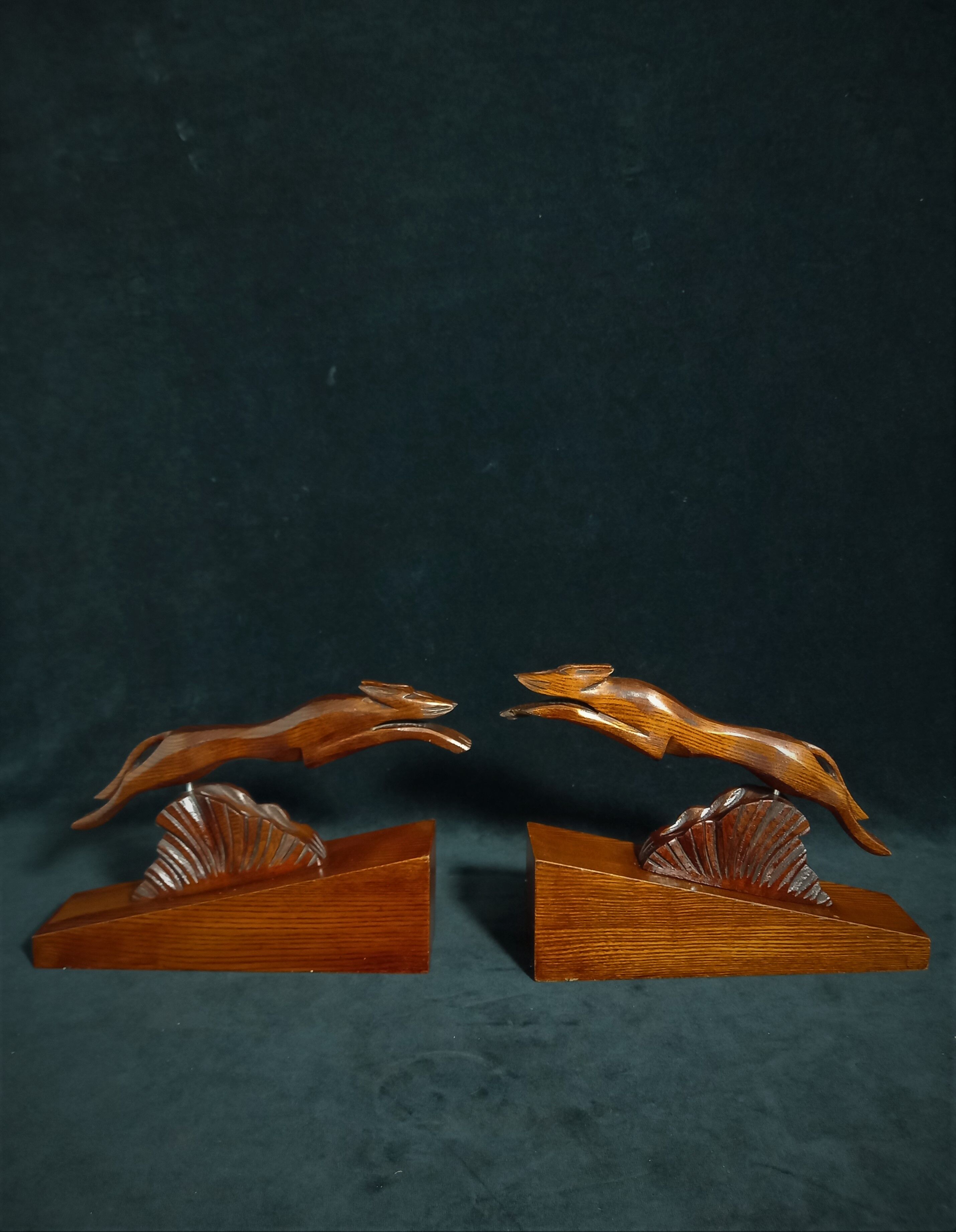 Pair of art deco wooden bookends with greyhounds