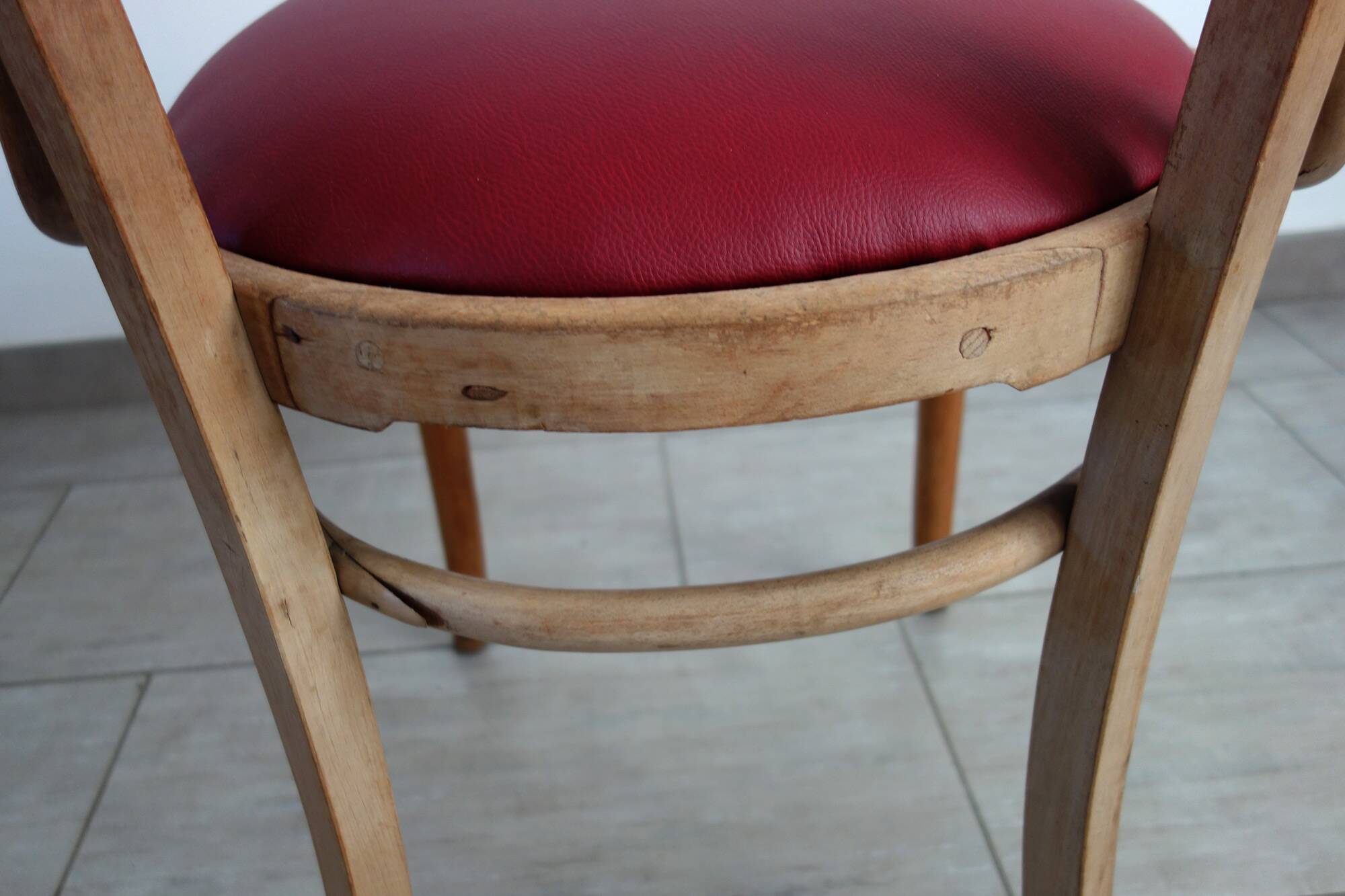 Vintage curved wooden armchair