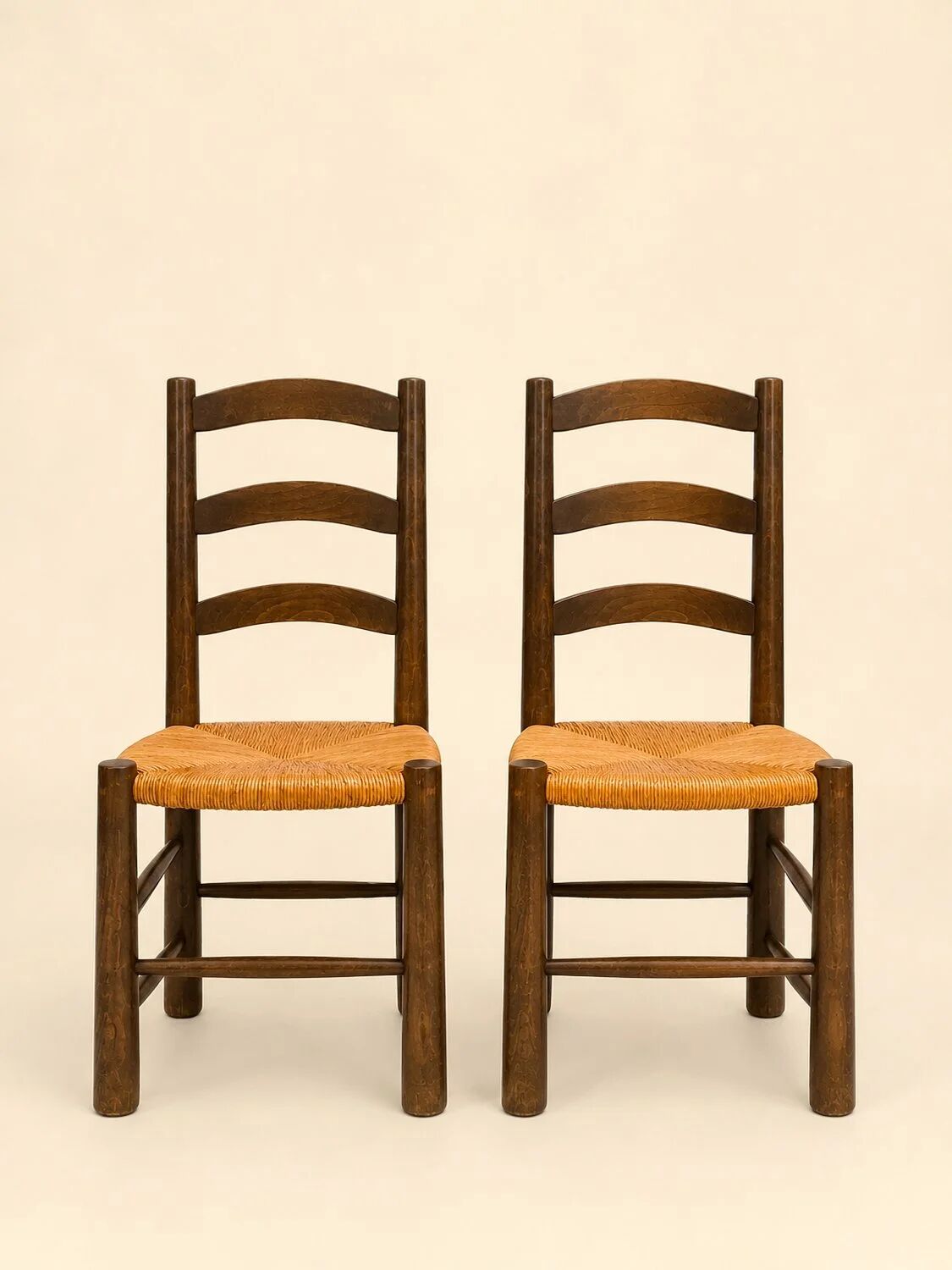 Set of four chairs in the style of Perriand.