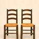 Set of four chairs in the style of Perriand.