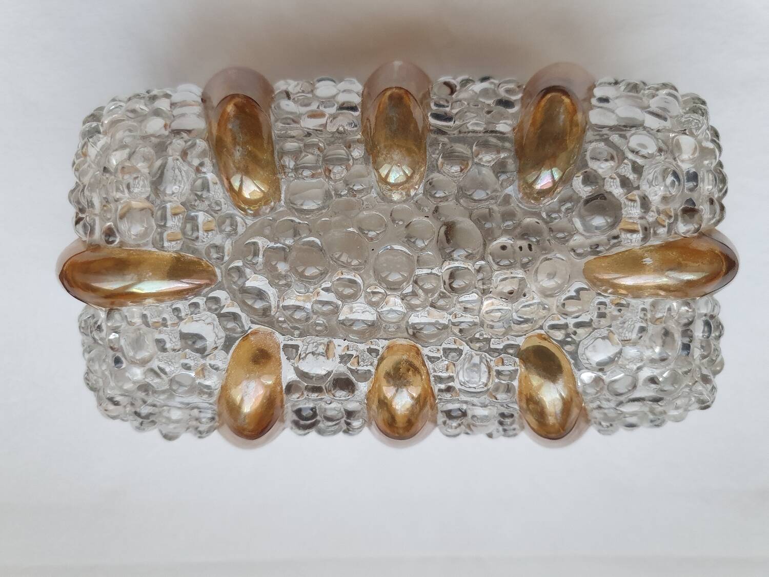 Bubble glass and amber wall light