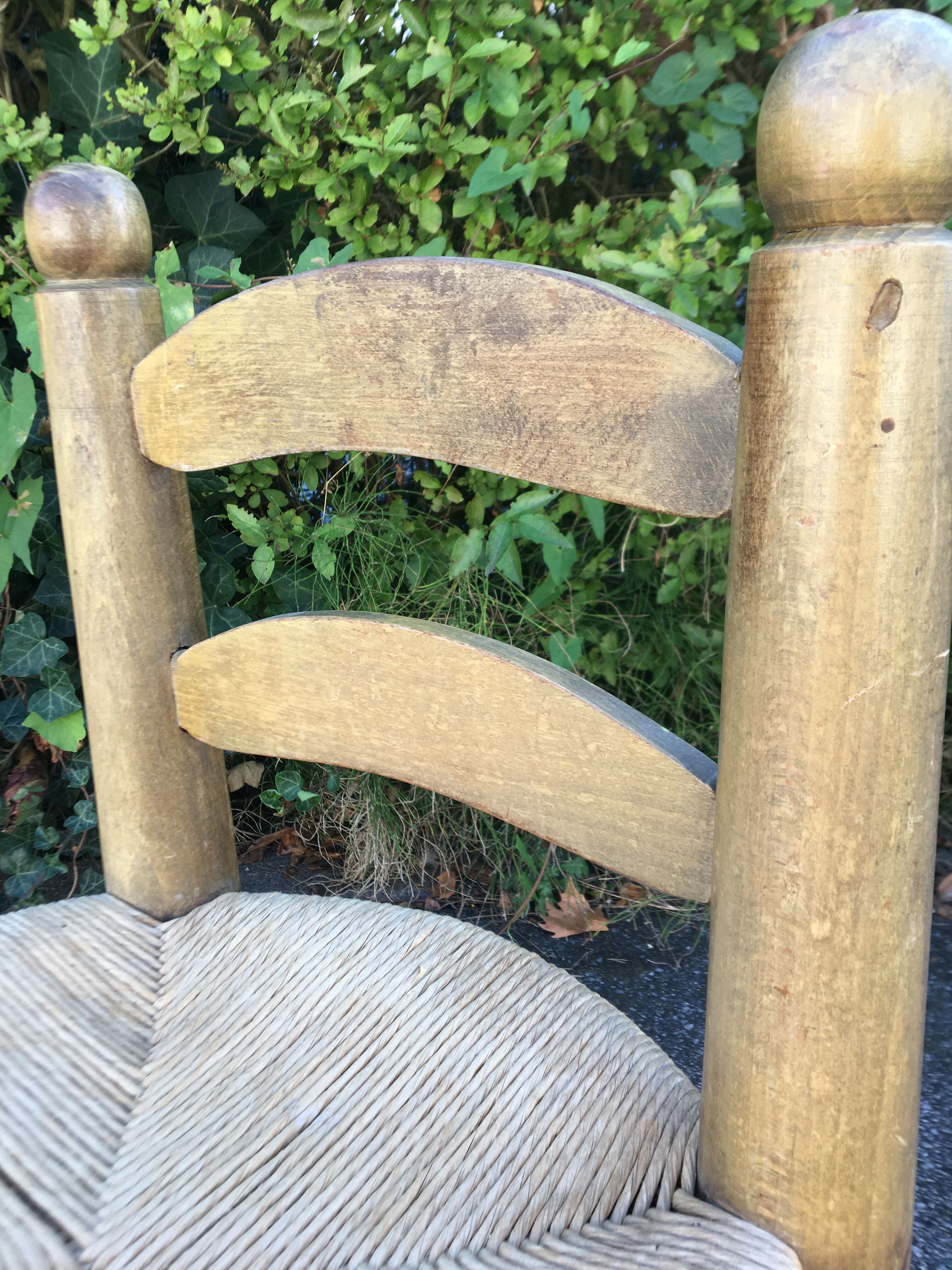 Low wooden chair and straw 50s