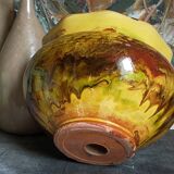 Old provencal pot cover in glazed terracotta