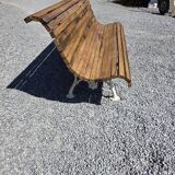 Antique garden bench made of cast iron and oak slats