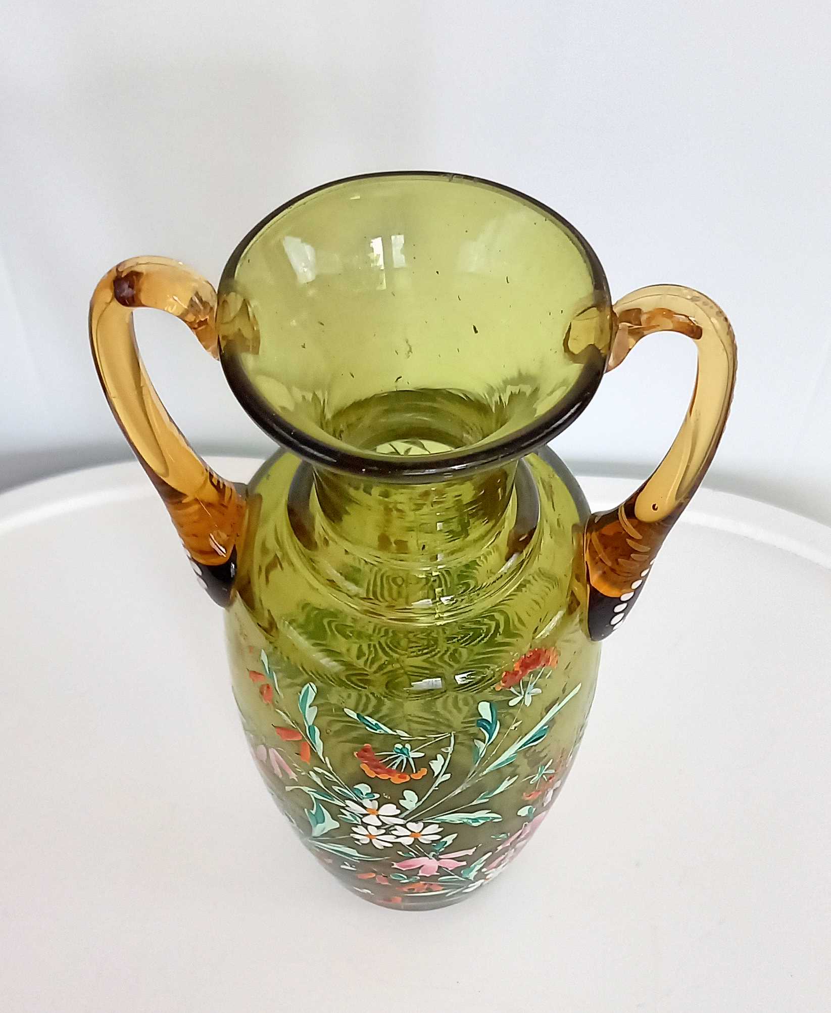 Enamelled green glass vase