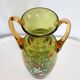 Enamelled green glass vase
