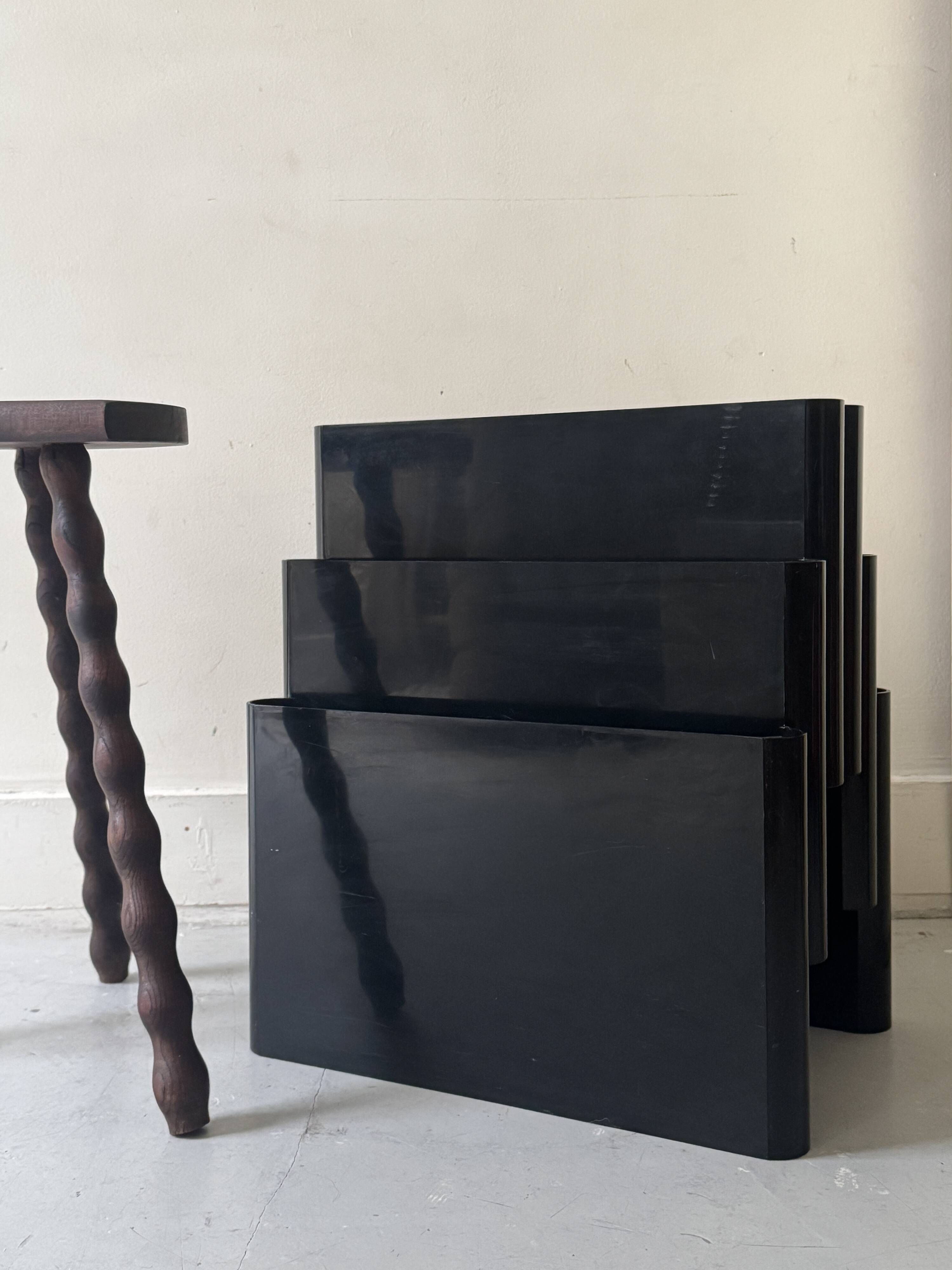 Large black magazine rack by Giotto Stoppino for Kartell, Italy 1970.